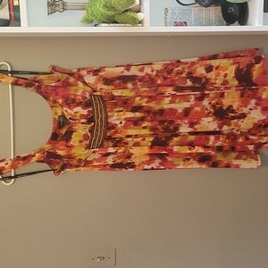 Multi colored dress size 14 with beaded front and tie in back